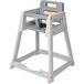 A grey high chair with a white frame.