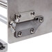 A close-up of the metal clamp on a Nemco Fine Cut Garnish Cutter.