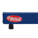 A blue rectangular Hatco heated shelf with a red and white logo.