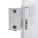 A white metal door hinge for a Carnival King PM850 popcorn machine.