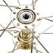 A close-up of a metal wheel with a metal hub.