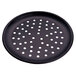 An American Metalcraft 10" round black hard coat anodized aluminum pizza pan with holes.