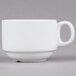 A Tuxton bright white china cup with a handle.