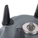 A close up of a black Waring 1 Qt. size adapter with metal knobs.