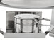 A Vollrath New York Retractable Dripless Round Chafer on a table in a professional kitchen.