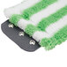A green and white striped mop pad.
