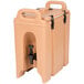 A tan plastic Cambro Camtainer with a handle and a tap.