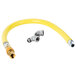 A yellow T&S gas appliance connector hose with two silver metal fittings.