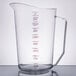 A Cambro clear polycarbonate measuring cup with red and blue measurement markings.
