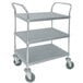 A stainless steel three shelf utility cart with wheels.