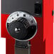 A red Bunn bulk coffee grinder with a black dial.