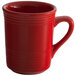 A red Tuxton Concentrix coffee mug with a handle.