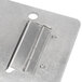 A metal Nemco Straight Chip Twister front plate with holes.
