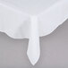A white Intedge square tablecloth with a folded edge.