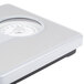 A close-up of a white and silver Conair Thinner dial scale.