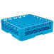 A blue plastic Carlisle glass rack with holes in it.