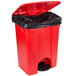A red Continental rectangular trash can with a black lid.