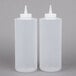 Two Tablecraft plastic squeeze bottles with white lids.