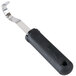 A white and black Tablecraft FirmGrip garnishing tool with a handle.