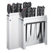 An Edlund stainless steel knife rack holding six knives.