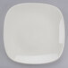 A Tuxton eggshell white square china plate.