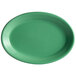 A green oval Tuxton china platter with a rim.