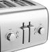 A close up of a KitchenAid Onyx Black four slice toaster with silver buttons.