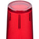 A red Cambro plastic tumbler with a crackle surface.