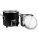 A black Vollrath stock pot with a silver lid.