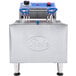 A Globe electric countertop fryer with blue and silver handles.