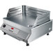 A large rectangular stainless steel Garland countertop induction griddle.