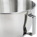 A white stainless steel KitchenAid mixing bowl with a handle.
