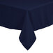 A navy blue rectangular polyester table cover with hemmed edges on a table.