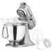 A KitchenAid Artisan Series Contour Silver stand mixer with bowl and attachment.