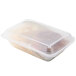 A clear plastic GET Reusable Eco-Takeout container with food inside.