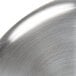 A close up of a Vollrath stainless steel pot lid.