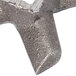 A close up of a #12 Meat Grinder Knife with a star on it.