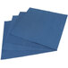 A stack of navy blue flat pack linen-like napkins.