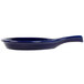A blue spoon shaped fry pan plate with a handle.