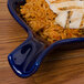 A blue CAC Festiware fry pan plate with rice and chicken on it.
