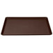 A brown rectangular tray with a brown surface.