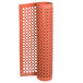 A roll of orange rubber Cactus Mat with holes.