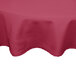 A mauve Intedge round tablecloth on a table.