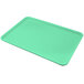 A Carlisle Tropical Green Glasteel bakery tray on a white background.