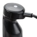 A black Hamilton Beach immersion blender with a cord attached.
