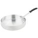 A Vollrath Wear-Ever saute pan with a TriVent silicone handle.