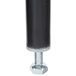 A black metal cylinder with a silver metal nut on top.