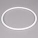A white plastic ring with a white circle on a gray background.