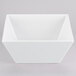 A white square Cal-Mil melamine bowl with a lid on it.