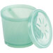 A close-up of a jade green plastic GET soup container with a lid.
